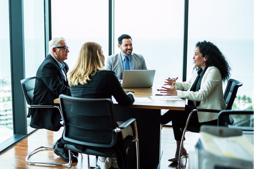 Team meeting discussing financial strategy