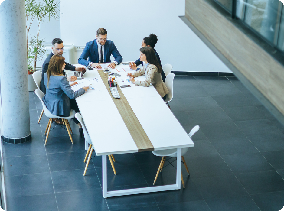 Team meeting reviewing financial documents